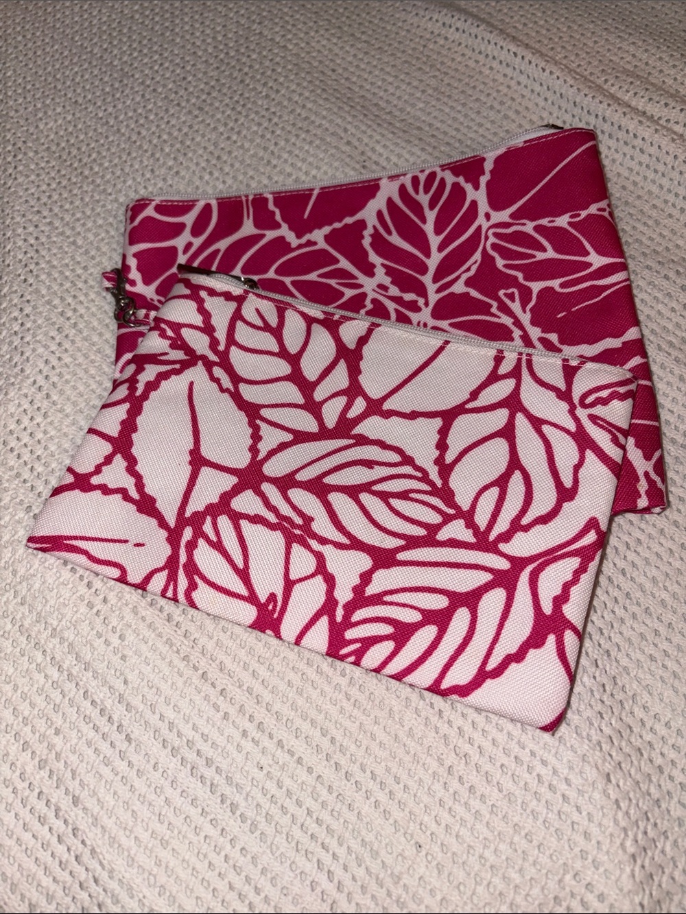 Clinique White and Pink Leaf Print Cosmetic Pouches